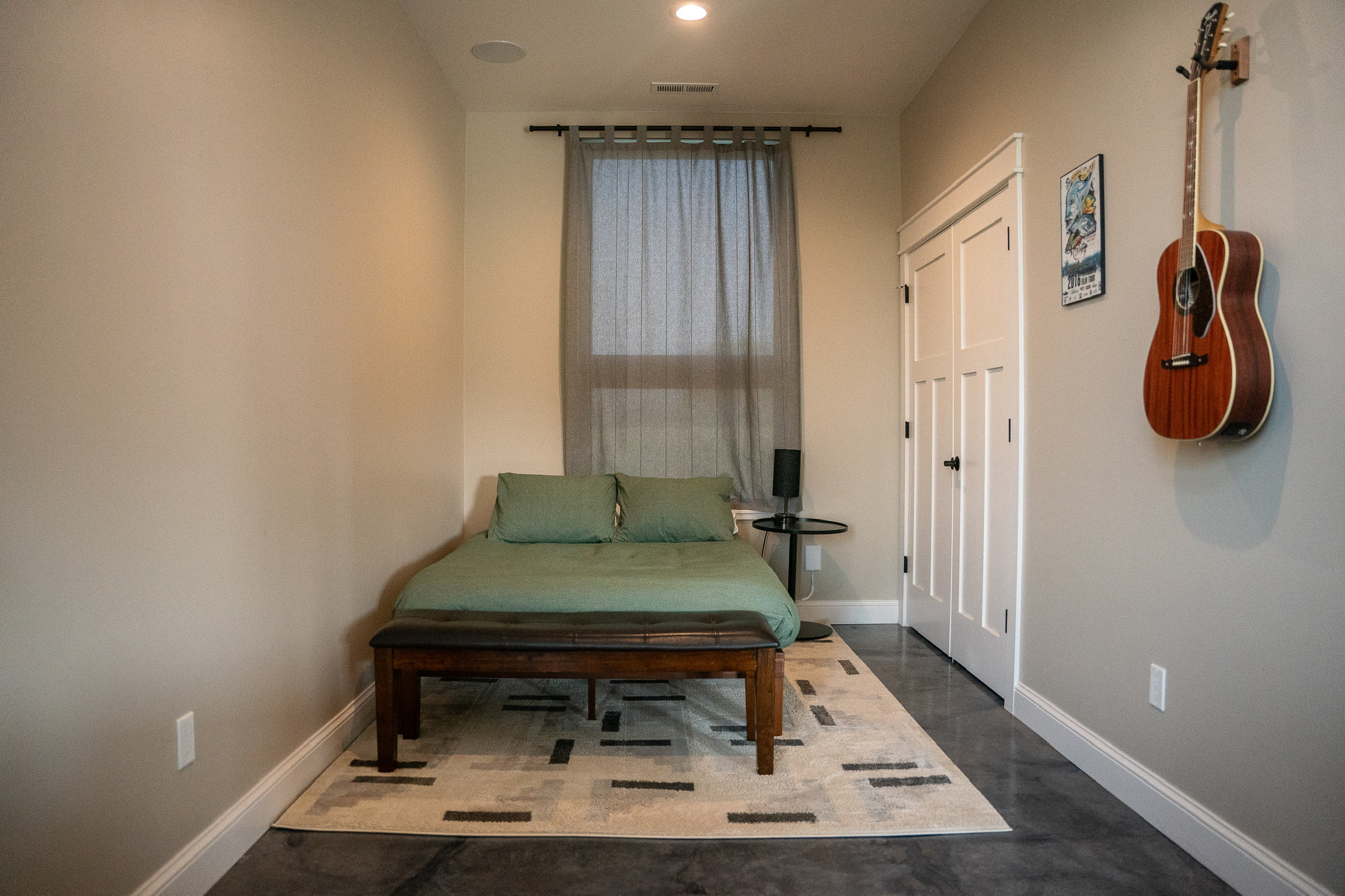 Office with a full bed at 3 Mile Cabin